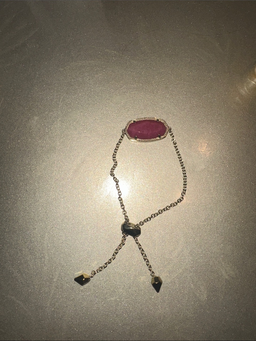 Kendra Scott Gold Bracelet with Magenta Stone Slider